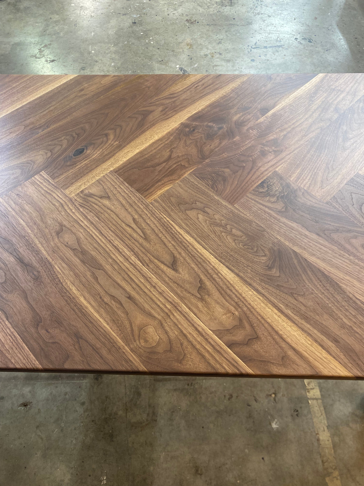 Walnut Herringbone Dining Room Table with Parsons Style Base